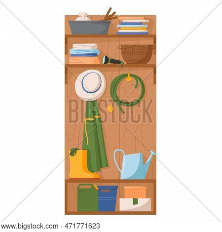 Gardening Tools And Clothers Hanging On A Wall