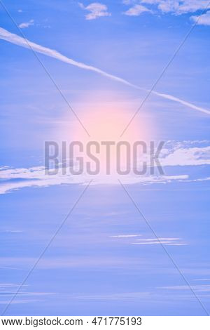 Blue Sky With White Clouds, Yellow Sun, And Condensation Trail. It Reminds Me Of A Nice Summer Day O