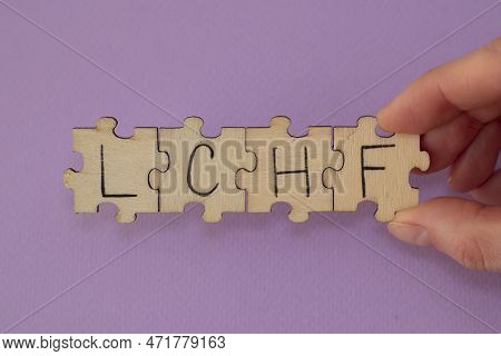 Written Word Abbreviation Lchf Low Carb High Fat On Wooden Puzzles.