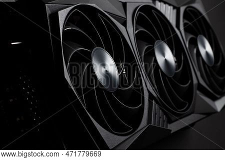 Video Card With Three Coolers From The Computer On A Dark Background.concept Computer Harware