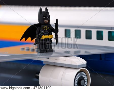 Tambov, Russian Federation - February 18, 2023 A Lego Batman Minifigure Standing On The Wing Of A Pa