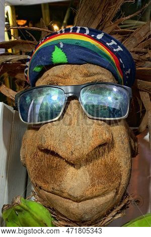 Creative Art Made In Coconut, The Head In Focus Features Human Facial Features Such As Mouth, Nose A