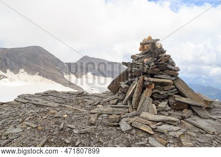 Cairn On Summit Of Eiswandbichl And Mountain Snow And Glacier Panorama With Summit Grosser Baerenkop