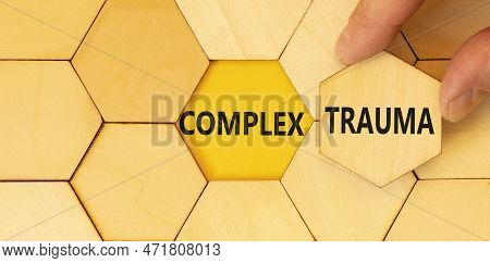 Complex Trauma Symbol. Concept Words Complex Trauma On Wooden Puzzles. Beautiful Yellow Table Yellow