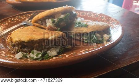 Gordibirrias, Mexican Gorditas Stuffed With Beef Birria And Onions