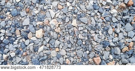 Pattern Of Small Gravel, Rock Or Stone On The Ground For Background. Hard Material, Art Wallpaper An