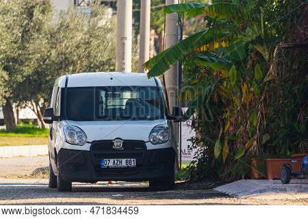 Side, Turkey -january 21, 2023:   White Hyundai I30  Is Parked  On The Street On A Warm Day Against 