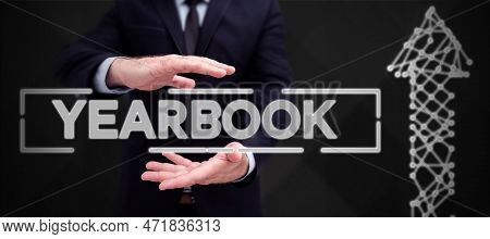 Sign Displaying Yearbook. Business Concept Publication Compiled By Graduating Class As A Record Of T