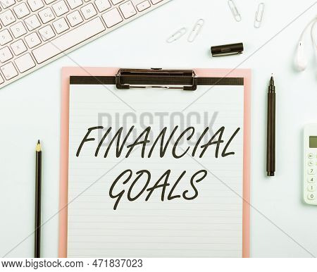 Hand Writing Sign Financial Goals. Concept Meaning Targets Usually Driven By Specific Future Financi