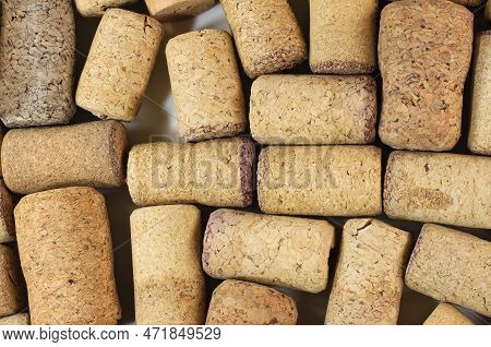 Abstract Background Of Wine Corks With Corks From Red Wine Bottles And Corks From White Wine Bottles