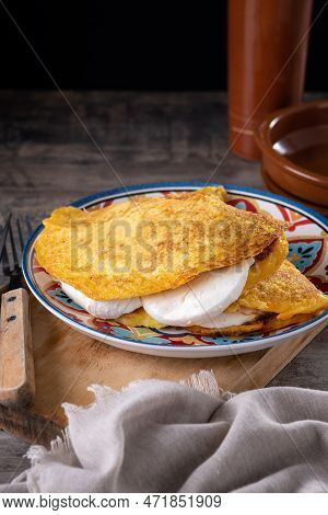 Traditional Venezuelan Beef Cachapa On Wooden Table