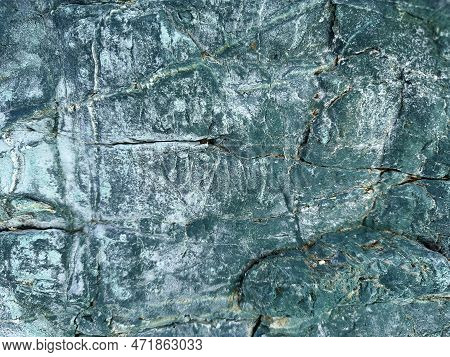 Background Image Of Light Blue Cracked Stone Surface. Abstract Nature Theme And Textures