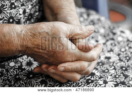 Hands Of The Old Woman. Senior's Hands..hands Of An 82-year-old Woman Resting On Lap