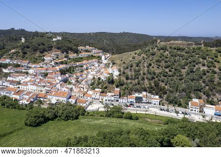 Aljezur Village In Costa Vicentina. View To The Old Small Town Of Aljezur With Traditional Portugues