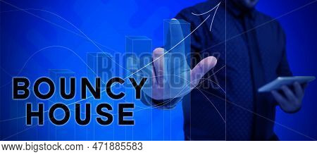 Hand Writing Sign Bouncy House. Conceptual Photo Automated Program That Runs Over The Internet Artif