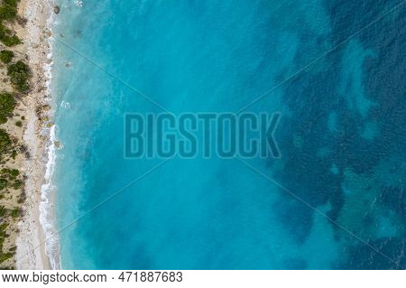 Straight Down View On Waves On Rocky Shore By Bunec Beach Area In Summer 2022, Albania