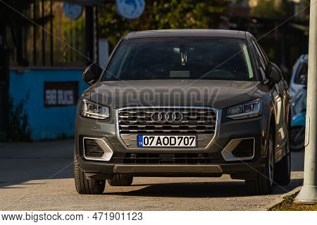 Side; Turkey - January 23 2023:     Black Audi Q2  Is Parked  On The Street On A Warm  Day