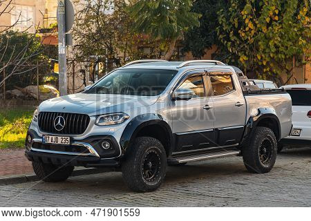 Side, Turkey -january 23, 2022:     Silver Mercedes-benz  X-class   Is Parked  On The Street On A Wa