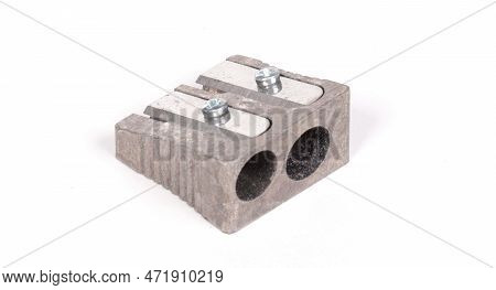 Old Manual Metal Pencil Sharpner On White Background