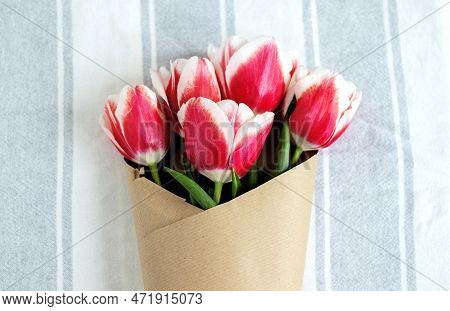 Tulips On Jeans And Spring Calling On Smartphone Kid Holding Flower