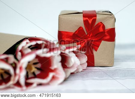 Tulips On Jeans And Spring Calling On Smartphone Kid Holding Flower