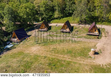 Southern Urals, Tourist Camp By The Mountain River Zilim Near The Kinderlin Cave. Aerial View.