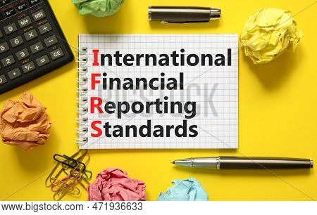 Ifrs Symbol. Concept Words Ifrs International Financial Reporting Standards On White Note On Beautif
