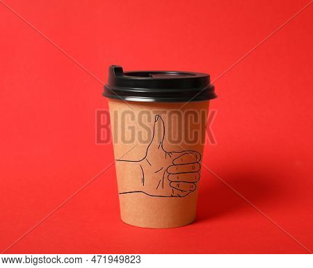 Takeaway Paper Cup With Thumbs Up Gesture Drawing On Red Background