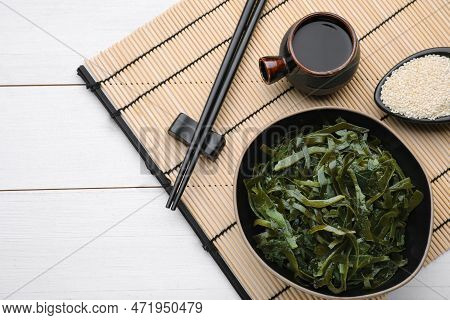 Fresh Laminaria (kelp) Seaweed Served On White Wooden Table, Flat Lay