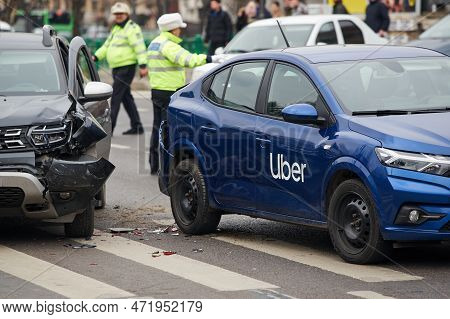 Bucharest, Romania - March 02, 2023: An Uber Logo Branded Car On The Road At The Place Where It Was 