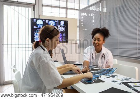 Group Of Medical Student Study In Class Room. Medical Students Studying Human Brain Disease Diagnosi
