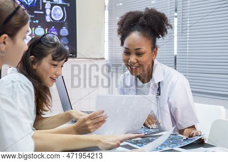 Group Of Medical Student Study In Class Room. Medical Students Studying Human Brain Disease Diagnosi