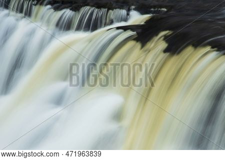 Beautiful Peaceful Landscape Image Of Aysgarth Falls In Yorkshire Dales In England During Winter Mor