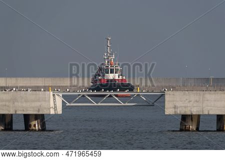 Fireboat - The Red Ship Is Maneuvering In Harbor