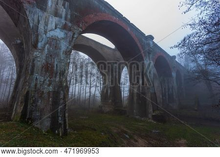 Old Concrete Railway Bridge In Stanczyki. Foggy Morning. Mazury, Poland