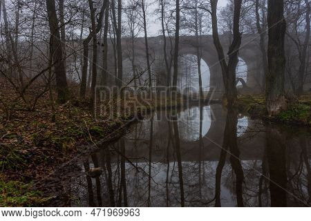 Old Concrete Railway Bridge In Stanczyki. Foggy Morning. Mazury, Poland