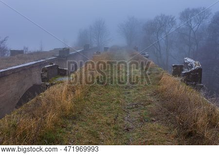 Old Concrete Railway Bridge In Stanczyki. Foggy Morning. Mazury, Poland