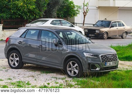 Side; Turkey - January 27 2023:     Gray Audi Q2  Is Parked  On The Street On A Warm  Day