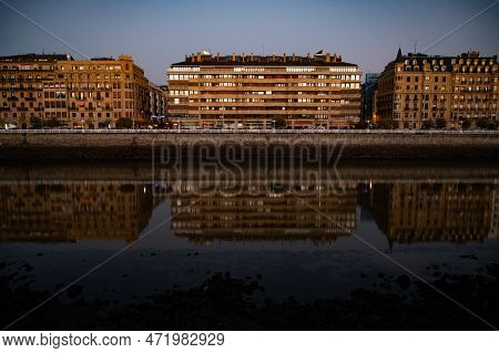 Evening Walk Along River In Central Part Of Donostia Or San Sebastian City, Basque Country, Spain