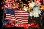 Fireworks display during fourth of July with American flag and bald eagle