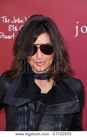 Gina Gershon at the John Varvatos 8th Annual Stuart House Benefit, John Varvatos Boutique, West Hollywood, CA. 03-13-11