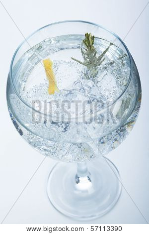 Rosemary And Lemon Gin Tonic Isolated Over White