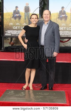 Robert Duvall and wife Luciana Pedraza  at Robert Duvall's Hand and Footprint Ceremony to celebrate his 