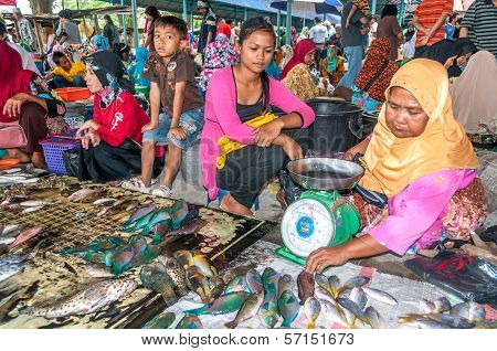 Woman Selling Fish