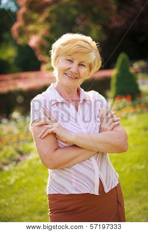 Certitude. Confident Trendy Senior Woman Pensioner With Crossed Arms