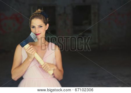 Cute serial killer holding an axe