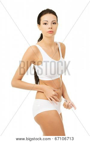 Diabetes woman patient make an abdomen subcutaneous syringe insulin injection with needle