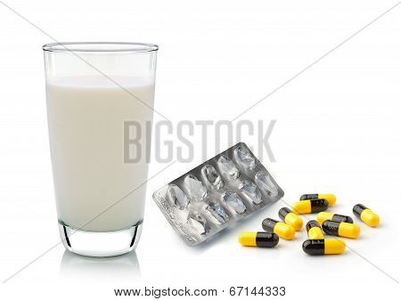 Glass Of Milke Mpty Pill Blister And Pills Capsules Isolated On White Background