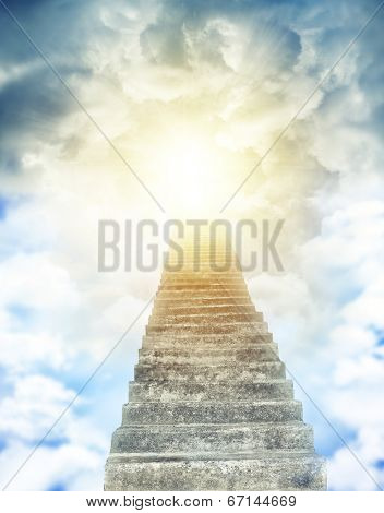 Stairway leading up to bright light 