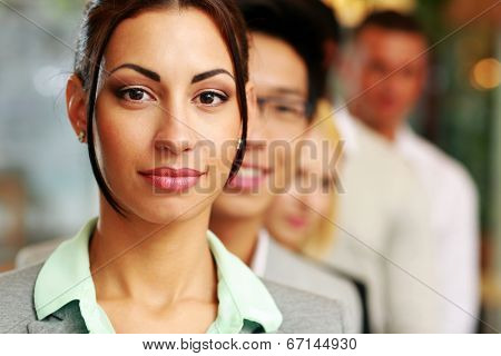 Group of business people in the office lined up